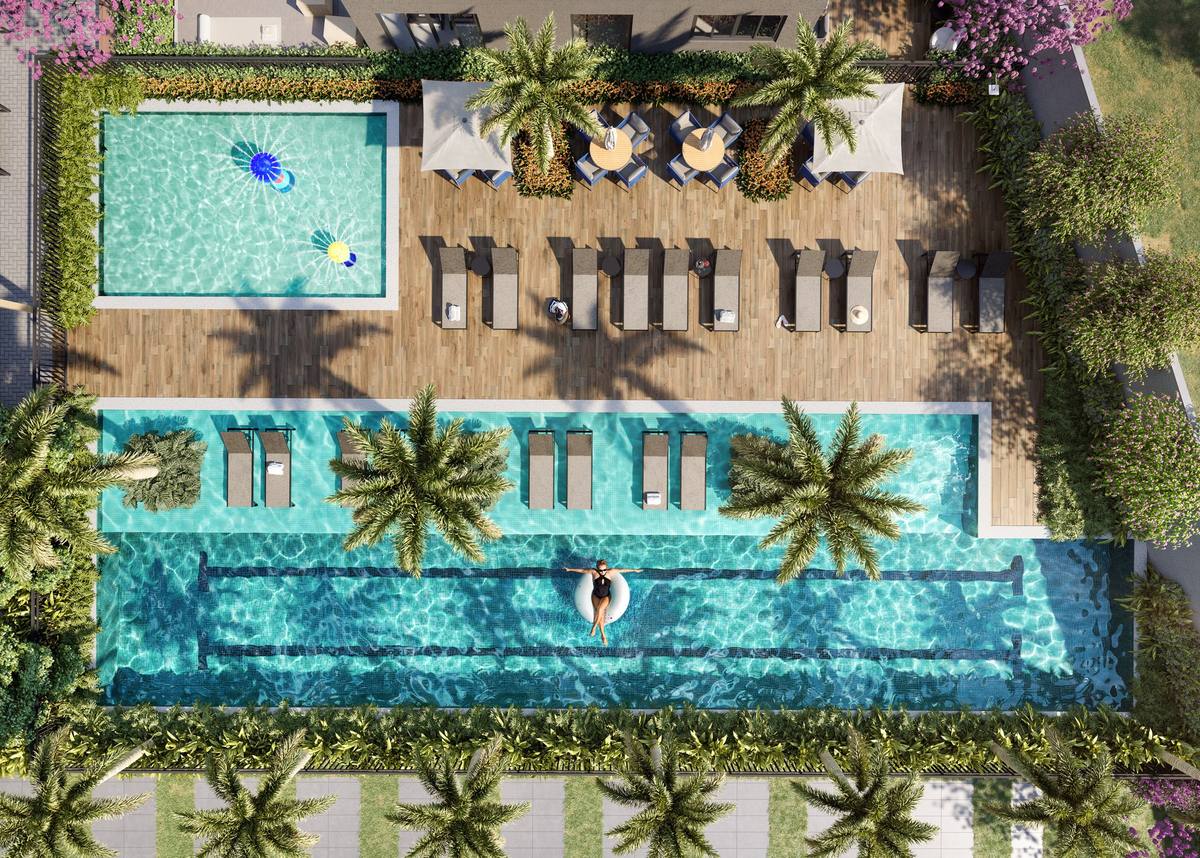 Imagem ilustrativa da vista aérea das piscinas e do deck molhado